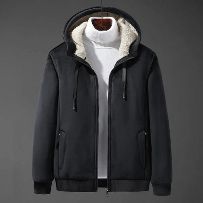 Black jacket with fur-lined hood on a mannequin against a gray background